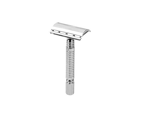 Detailný pohľad na klasický kovový holiaci strojček s ostrou žiletkou