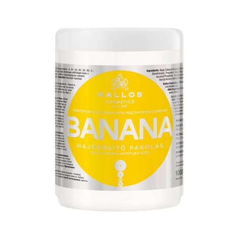 fľaša šampónu Kallos Banana s banánmi v pozadí