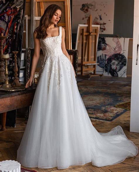 Svadobné šaty s odnímateľnou vlečkou