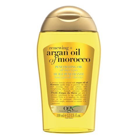fľaša šampónu OGX Argan Oil Of Morocco v kúpeľni