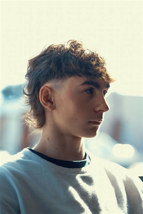 Pánsky účes Mullet z 80. rokov