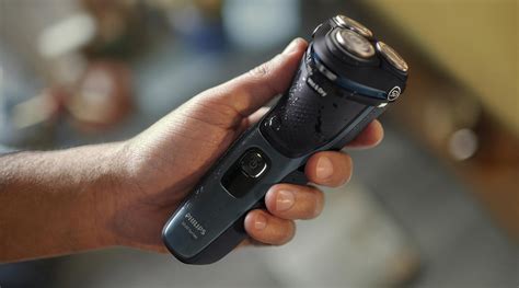 Ergonomická rukoväť holiaceho strojčeka